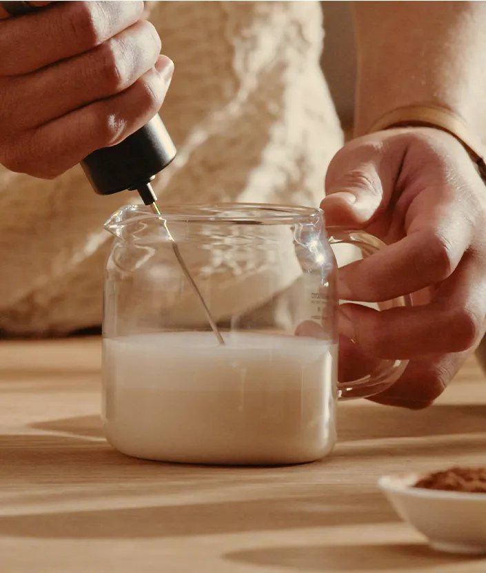 Espumar la leche