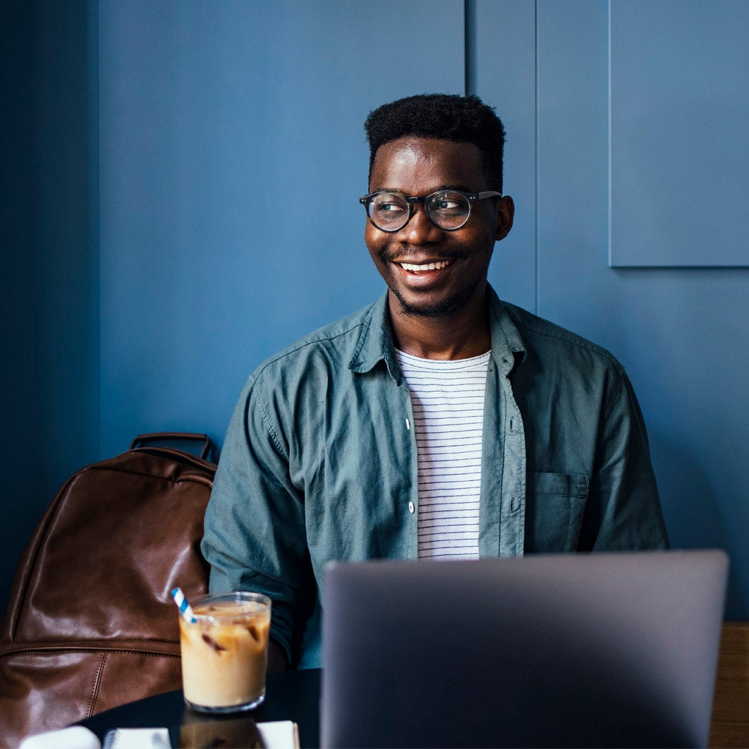 Man drinking iced coffee