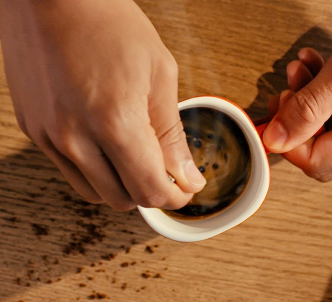 Stirring a cup of coffee