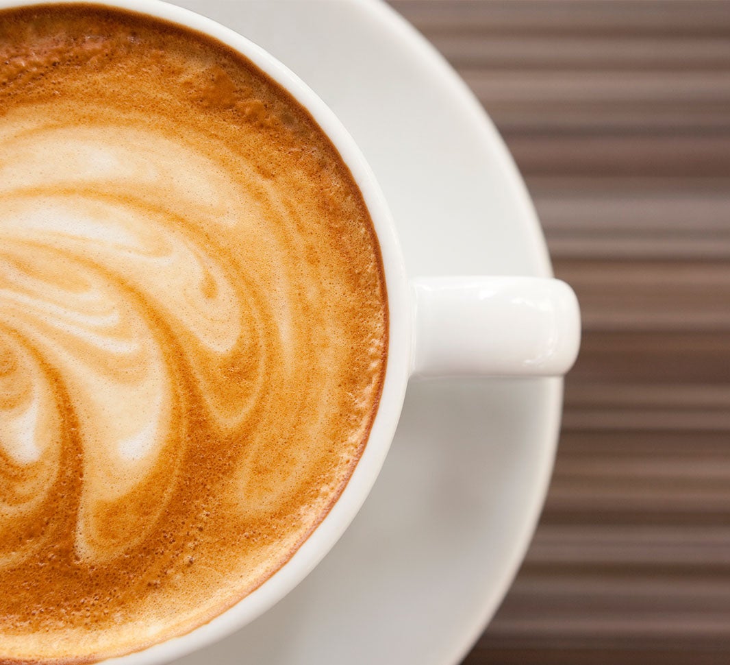 Flat white coffee in cup