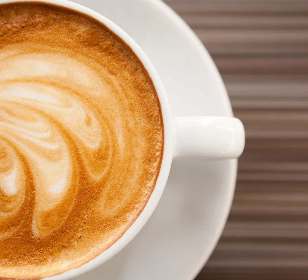 Flat white coffee in cup