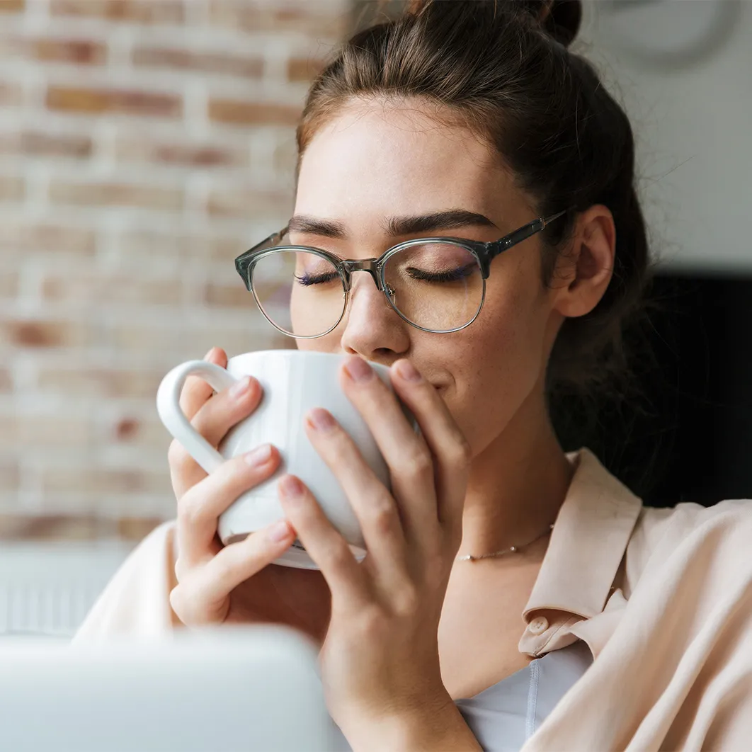 Woman drinking coffee