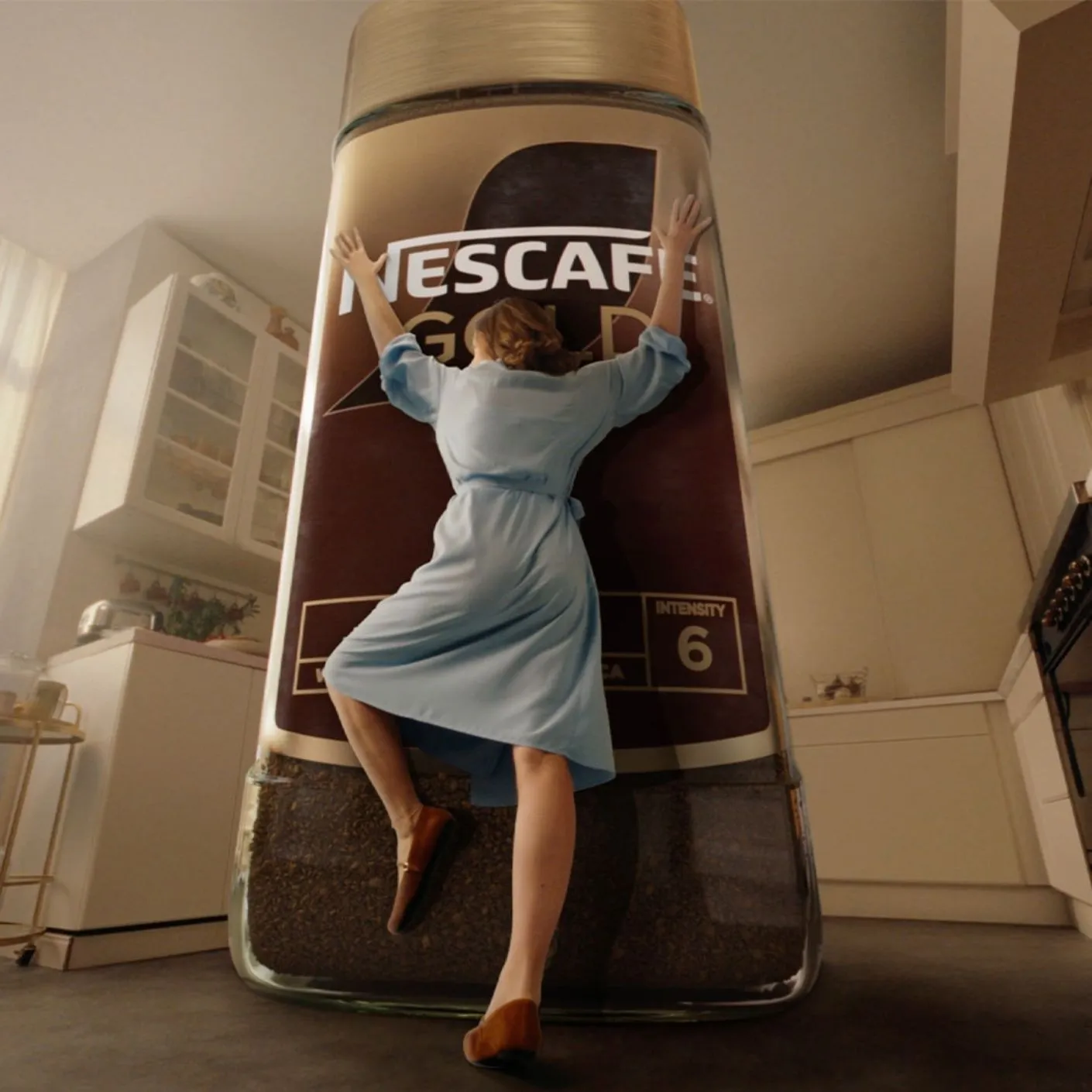 Woman hugging Nescafé product