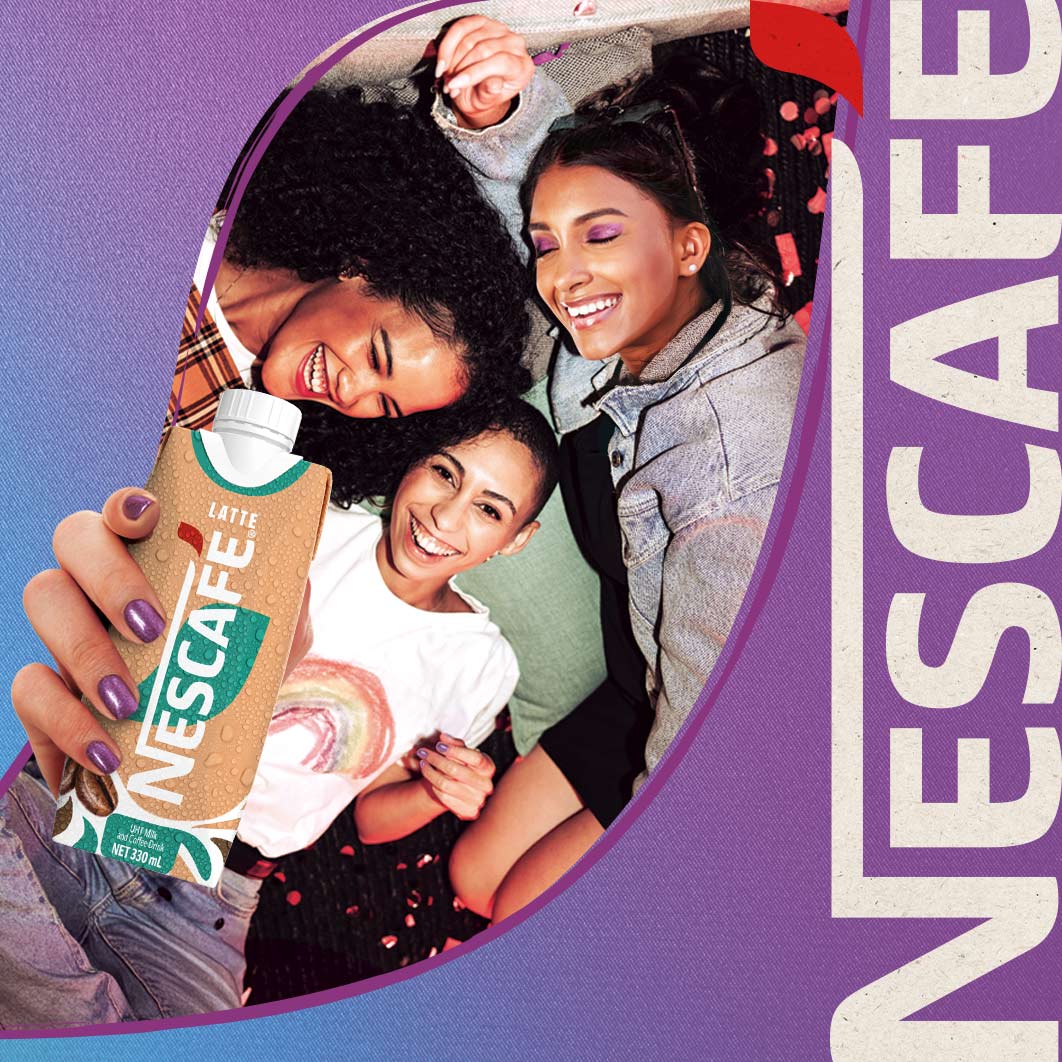 Friends holding Nescafe Ready-to-Drink Latte