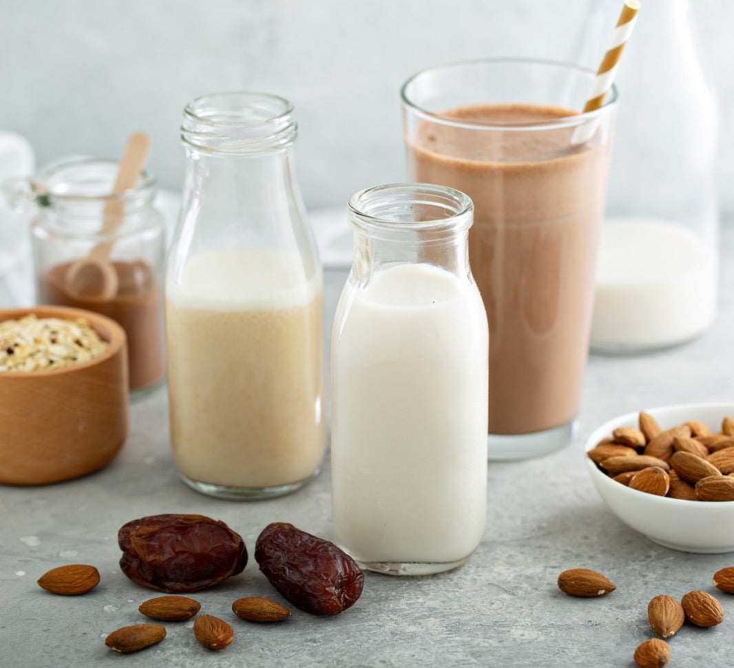 Picture of table full of non dairy milks