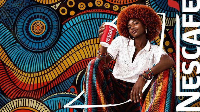 Stylish young woman holding a NESCAFÉ, expressing her confidence and personal vibe.