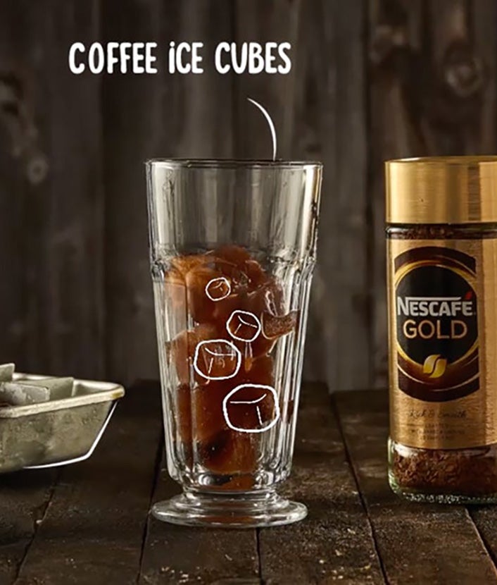 Coffee with cocoa recipe, step 2: Glass with coffee ice cubes and NESCAFÉ GOLD glass