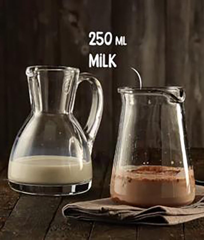Coffee with cocoa recipe, step 3: carafe with cocoa and carafe with milk