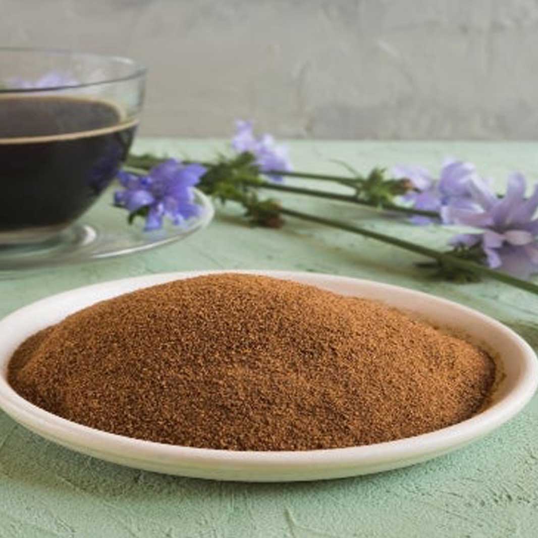 Cup of black coffee and ground chicory