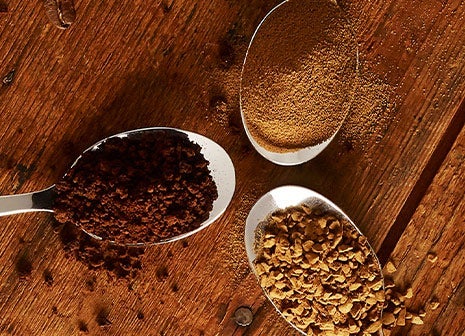 3 spoons containing coffee granules and powder