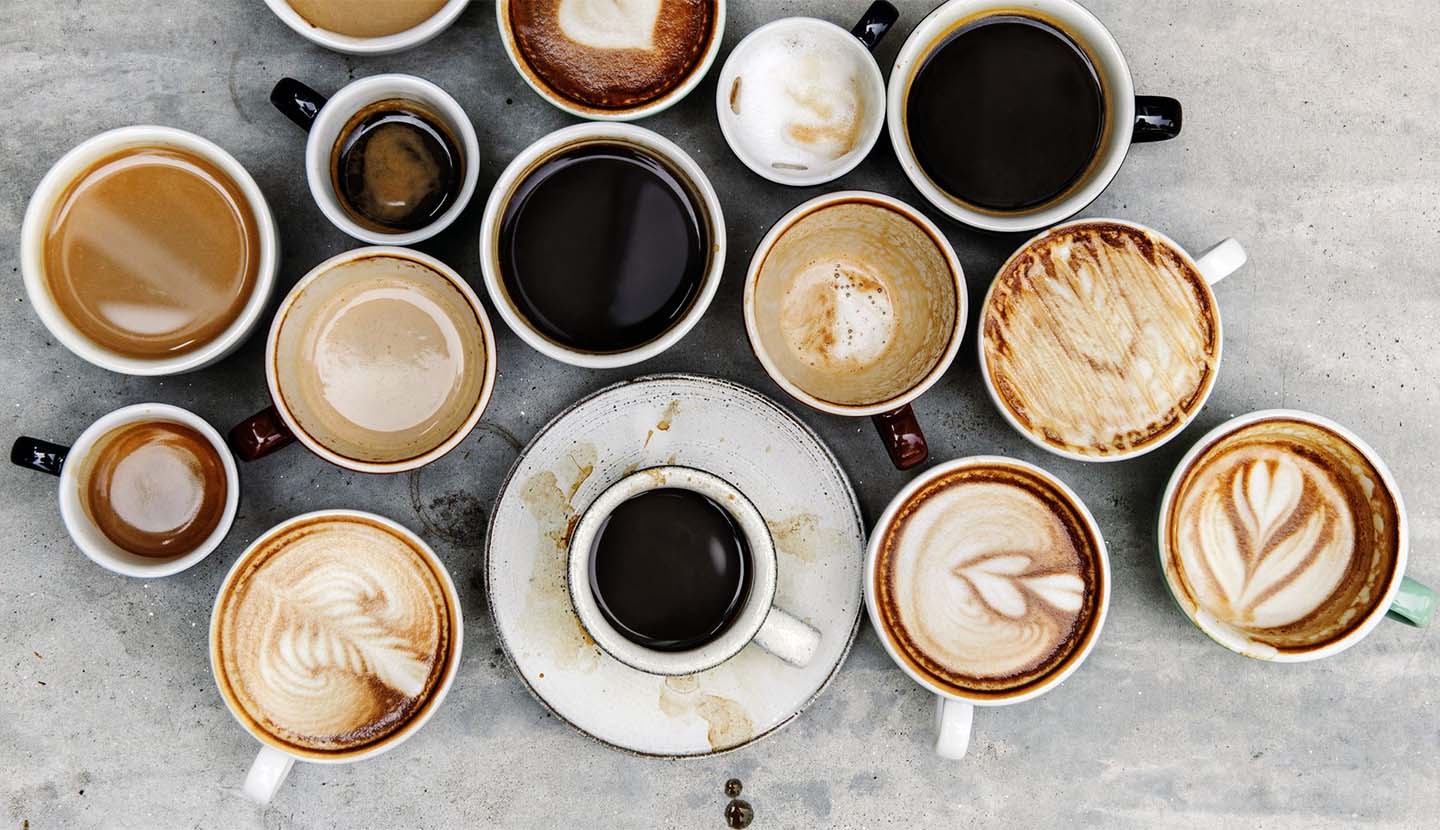 different types of coffees in mugs