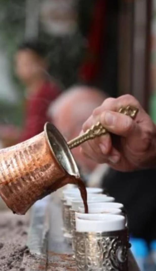 A row of Turkish coffees being served