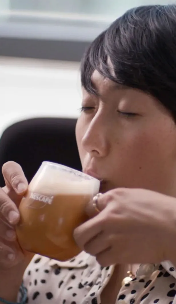 woman drinks coffee