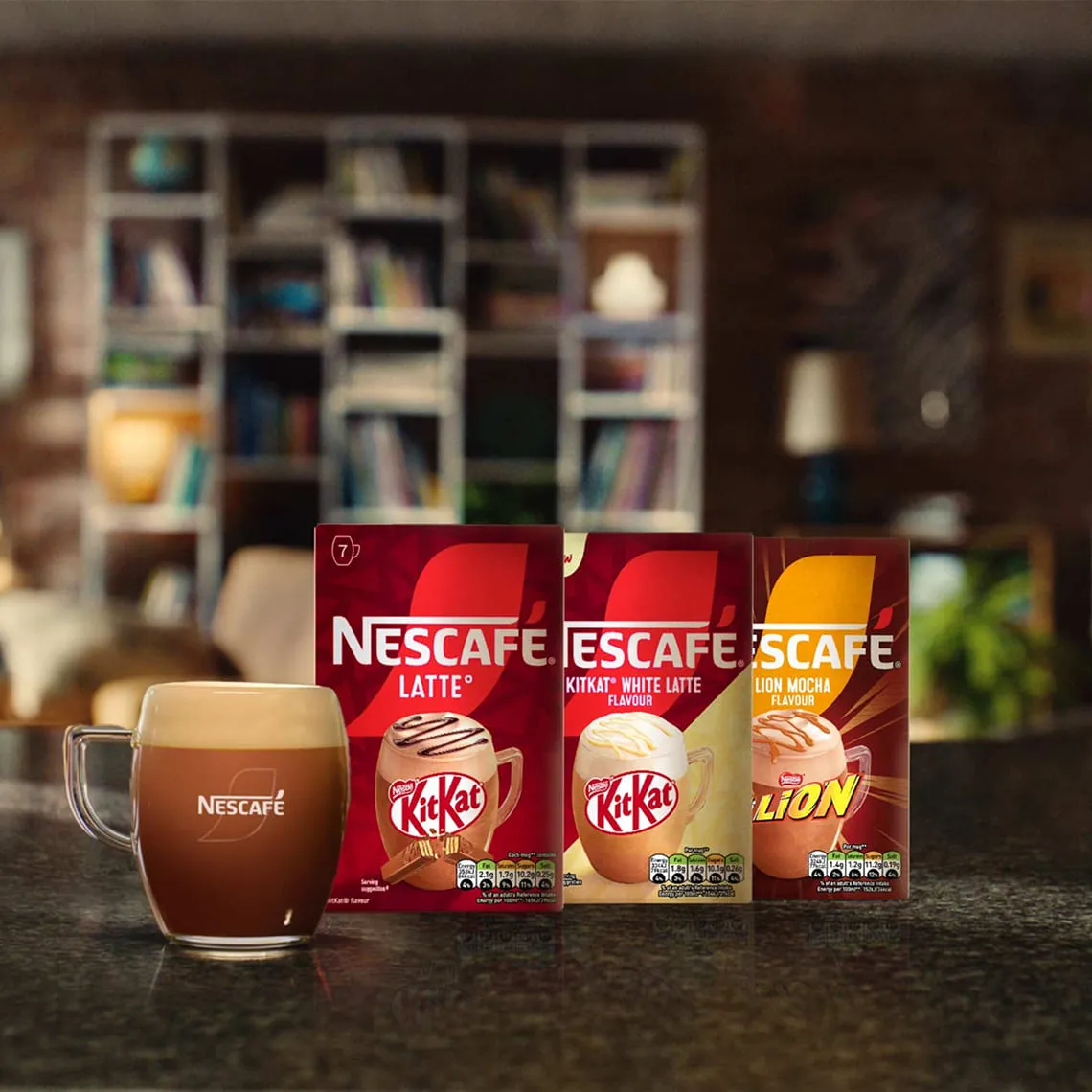 Cup of frothy NESCAFÉ chocolate latte 