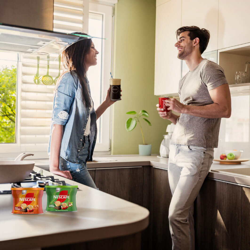man and woman having a coffee