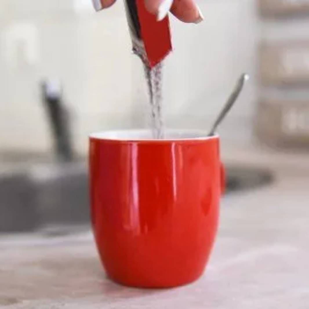 pouring-instant-coffee-in-mug-desktop