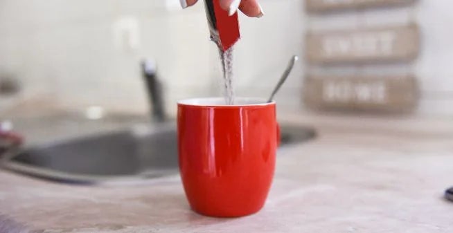 pouring-instant-coffee-in-mug-desktop.