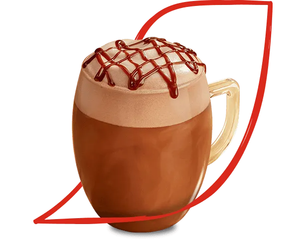 Glass mug with NESCAFÉ Quality Street Green Triangle Mocha coffee inside