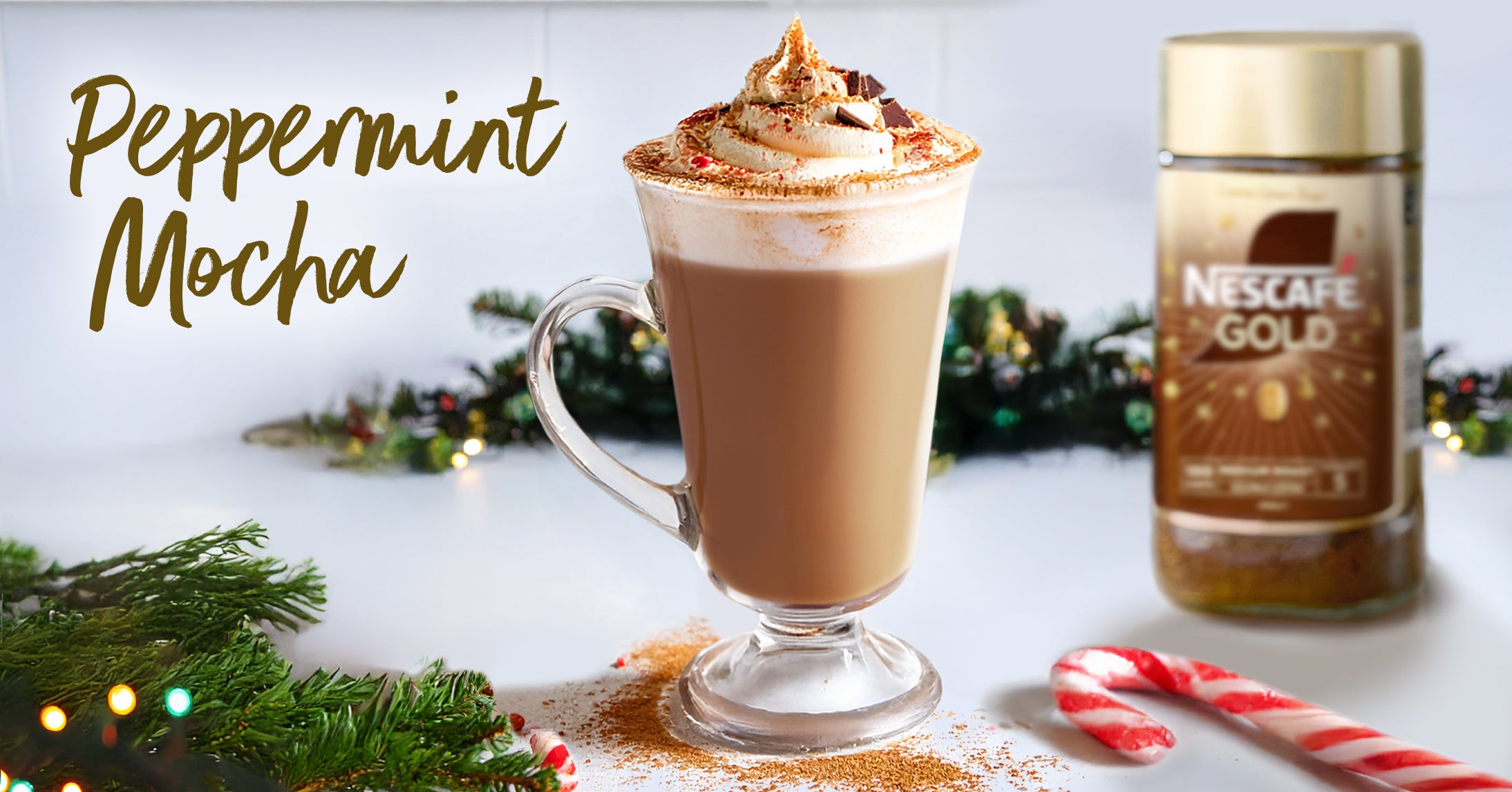 Peppermint Mocha Nescafé Gold Peppermint Mocha combines rich, smooth coffee with decadent chocolate and a refreshing peppermint twist. Its deep, mocha hue and frothy top offer a cool, festive indulgence.