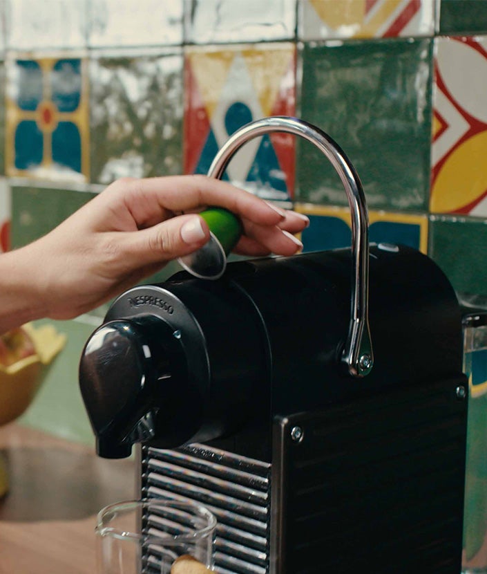 Making an espresso with a Nespresso machine