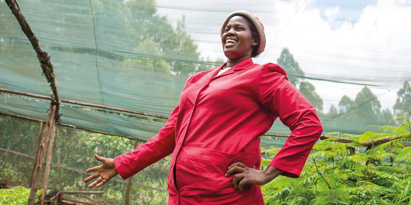 Kenya woman at coffee farm 
