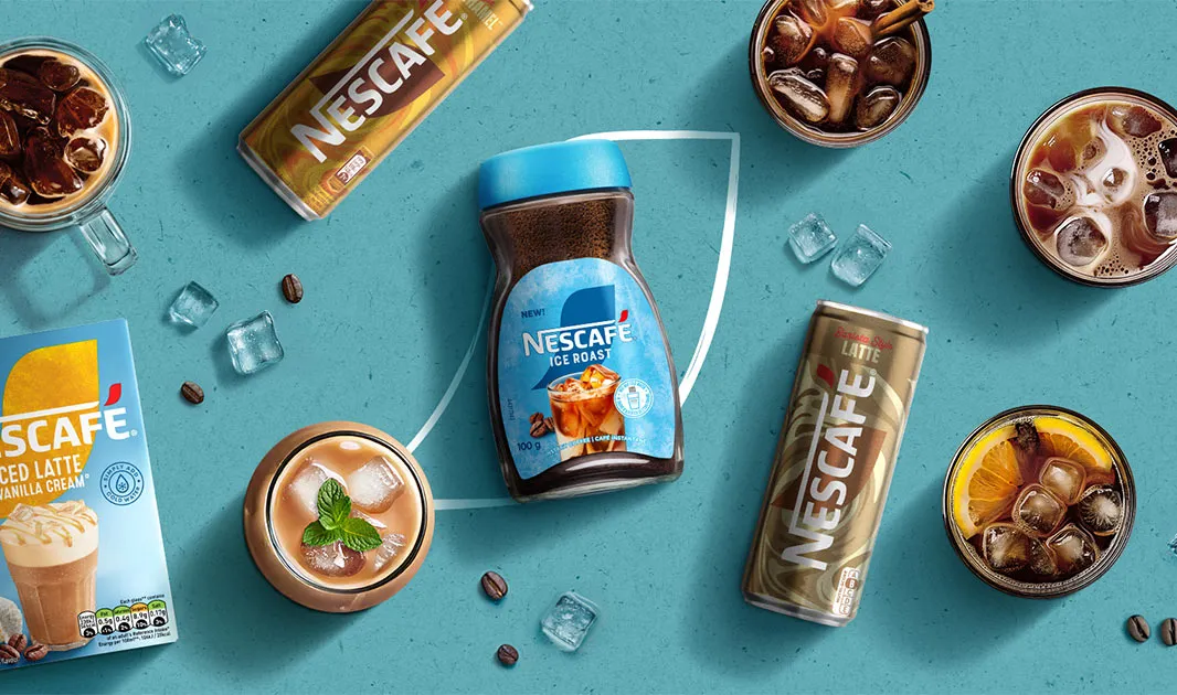 A collection of NESCAFÉ® products and glasses of iced coffee