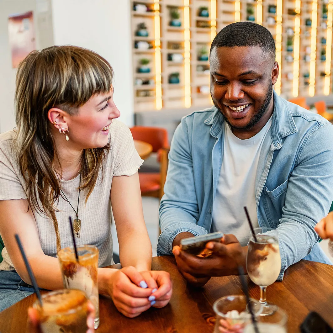 Two people drinking espresso concentrate