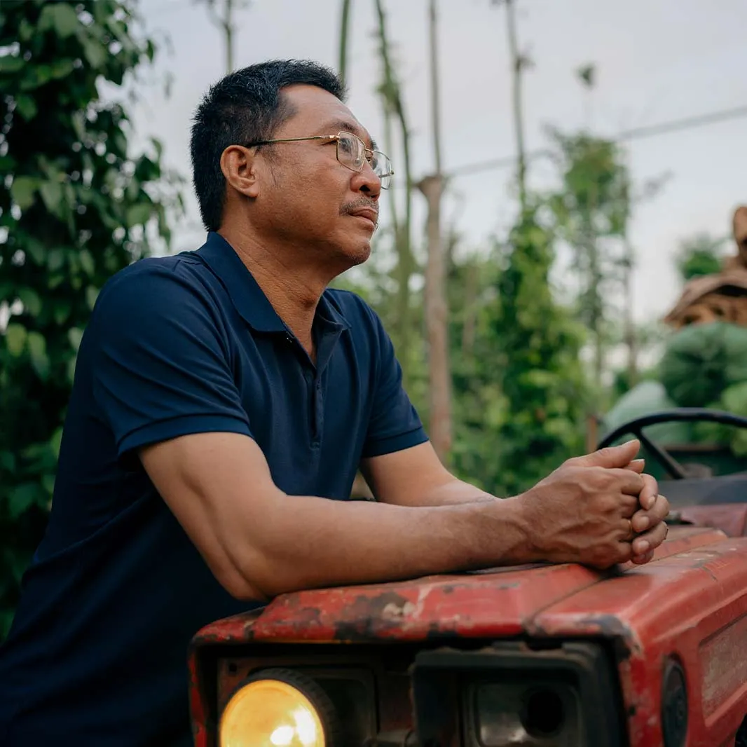 Coffee farmer using regenerative agriculture practices on the farm