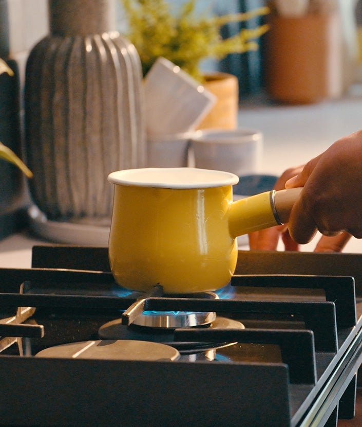 Melting Chocolate with milk in a pot
