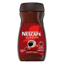 A jar of Nescafé Clásico Dark Roast with a black cap, brown label and red coffee mug.