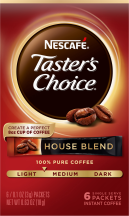 A red box of Taster’s Choice House Blend instant packets with coffee beans near the Taster's Choice logo.