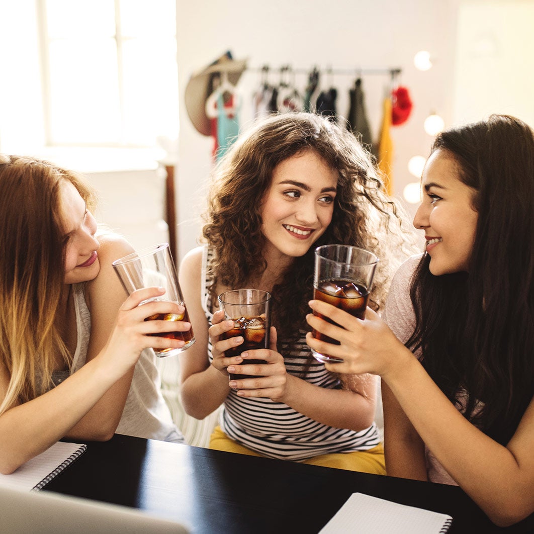 Three people drinking espresso concentrate